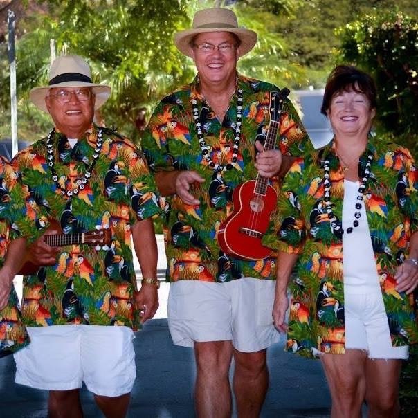 The 'Hawaiians at Heart' band is outifitted in our Sunset Parrots Hawaiian Shirt