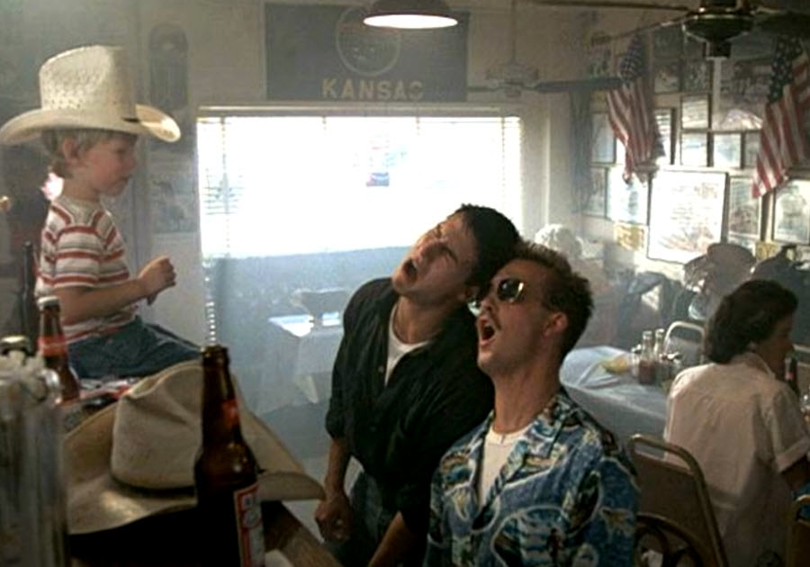 Top Gun movie scene with HST Honolulu shirt on Goose singing to kid